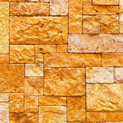 A representative image of stone cladding on the wall at a Goan house.