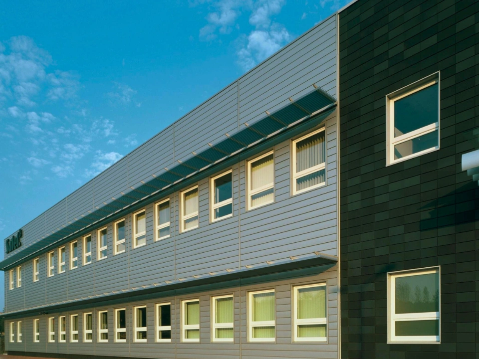 Aluminium louver system installed on terrace parapet